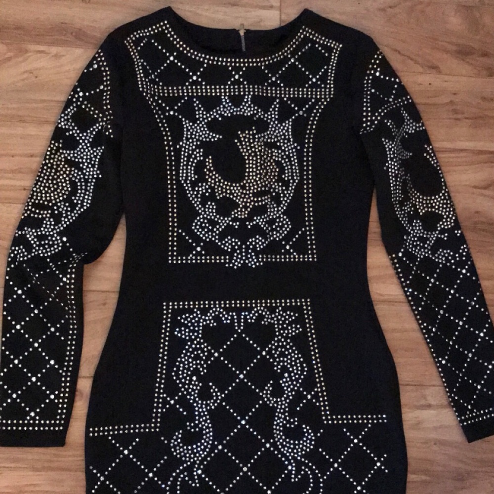 Studded black party dress.